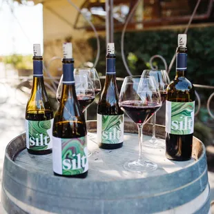 a barrel of wine and a glass of wine