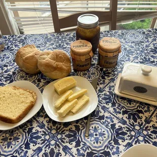 Portuguese bread, butter, cheese and jam.