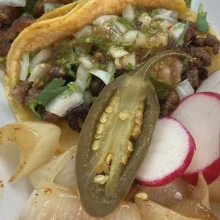 Pastor and Carne Asada tacos.