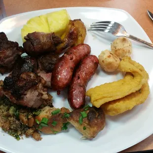 Picana, beef rib, chicken, linguica, fried bananas, fresh pineapple, beans w/ sausage, fried fish, and picana wrapped in bacon.
