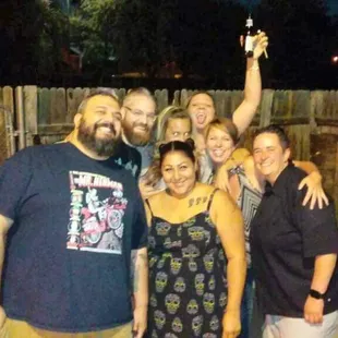 a group of people posing for a picture