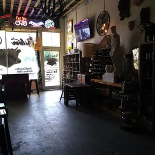 inside of a restaurant with tables and chairs