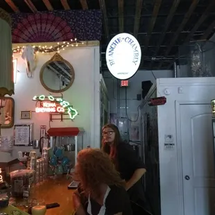 a group of people in a bar