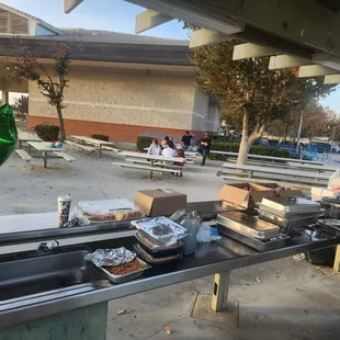 Kitchen area with a working sink! There's a grill as well