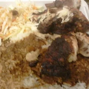 Jerk chicken, white rice and coleslaw, stew bef gravy.