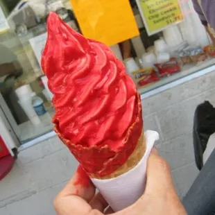 Vanilla-chocolate twisted soft serve dipped in cherry. This is their baby size (at ~$1.00).