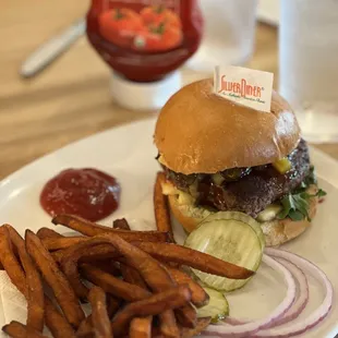 a burger and french fries on a plate