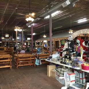 Most of the store is tables and chairs for the &quot;cafe.&quot;
