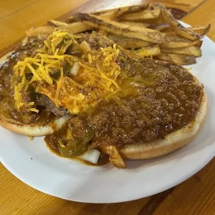 A belly full of beef. Open face chili burger.
