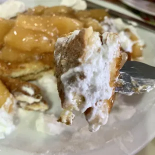 Two Pancakes with apples and whipped cream