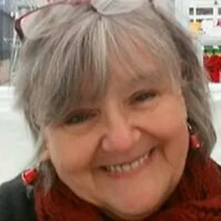 Judi B.