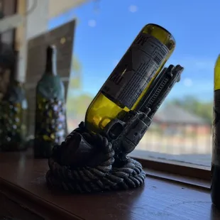 a wine bottle on a rope