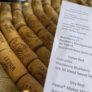 wine corks and a menu