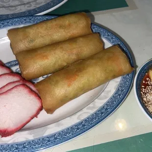 BBQ pork and vegetable spring rolls.