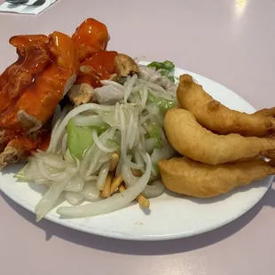 Lunch combo. Sweet and sour chicken, chicken chow mien and deep fried prawns.