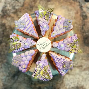 a cake with purple frosting