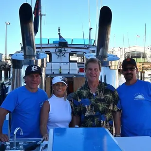 The Silver Fox crew - Captain Dave, Gayle, Captain Chris, and Jeff
