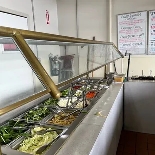 a buffet with a variety of vegetables
