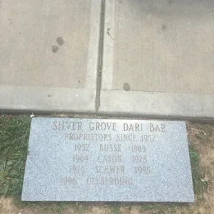 plaque on sidewalk
