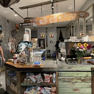 a man standing in front of a counter