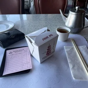 My leftovers, the bill and tea.