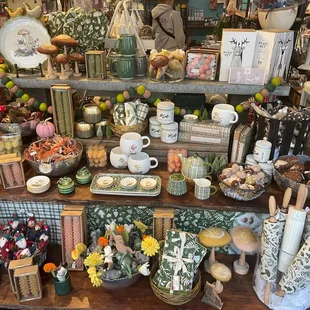 Woodland holiday collection on our front table - perfect for blending fall into holiday!