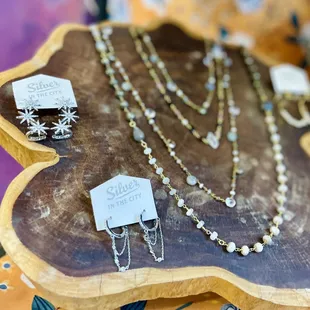 Add some sparkle to your gifts and your gal! 
https://www.silverinthecity.com/search/sparkle/