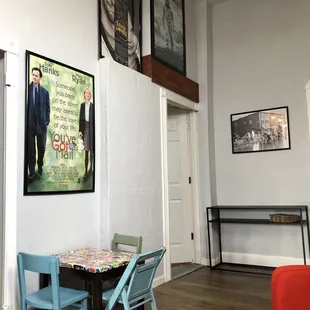 Kiddie table and the bathroom is through the door behind it