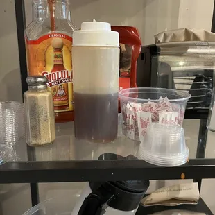 Unlabeled bottle of liquid (it&apos;s honey, not syrup)