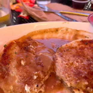 biscuits and gravy are not traditional. they use brown gravy ?