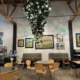 Upside down Christmas tree and local artwork.