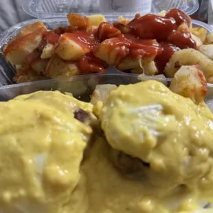 Crab Benedict with Home Fries. I asked for ketchup for my potatoes ... they put ketchup on them instead of ketchup packs. Weird