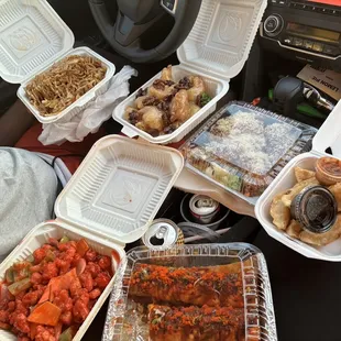 2 lion kings, 2 crunch california roll, shrimp and Chicken Chow Mein, Gyoza, Honey Walnut Shrimp, sweet and Sweet sour chicken