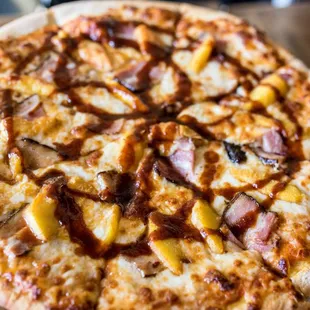 Peach House Cured Pork Belly Pizza w/ black cherry cola BBQ drizzle