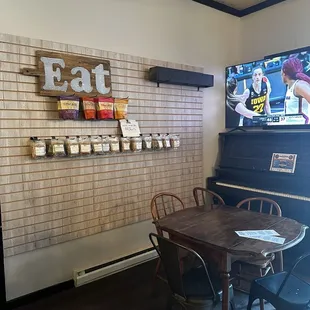 a flat screen tv and piano