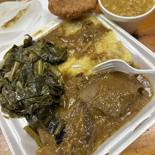 Delicious Beef Liver (Tuesday, Thursday Only), collard greens, white beans, mashed potatoes, and a hot water roll.