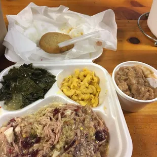 Chicken &amp; dressing, greens, Mac &amp; cheese, and pinto beans with hot water corn bread.