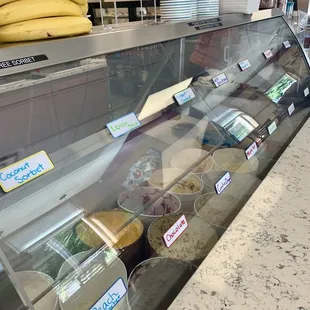 a display case filled with different types of food