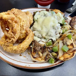 Cheesesteak sandwich with Onion Rings
