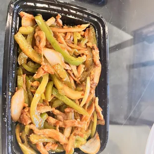 Shredded pork with chili pepper. Disproportionally between meat and peppers and onions.