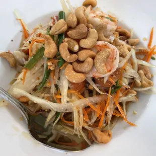 Papaya Salad ($13.95) with shrimp and peanuts.