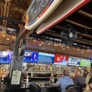 a surfboard hanging from the ceiling