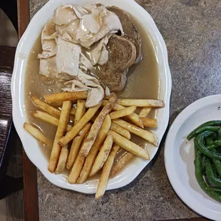 Open faced turkey sandwich,  French fries, and greenbeans