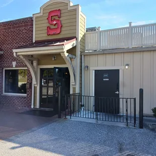 Entrance in rear of the building