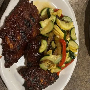 Baby Back Ribs- Half Rack of Baby Back Ribs with seasonal vegetables