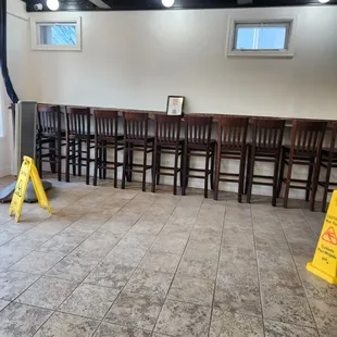 a row of chairs in a restaurant