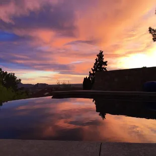 sunset reflecting in pool
