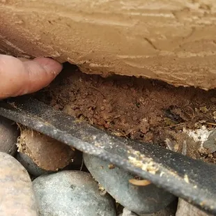 My husband can put his hand under our deck