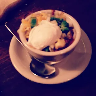Side of chili with dinner