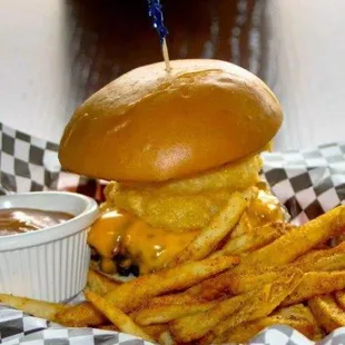 One of our favorites the John Wayne burger! A burger with bacon, cheese, onion rings and served with a bbq, ranch side!